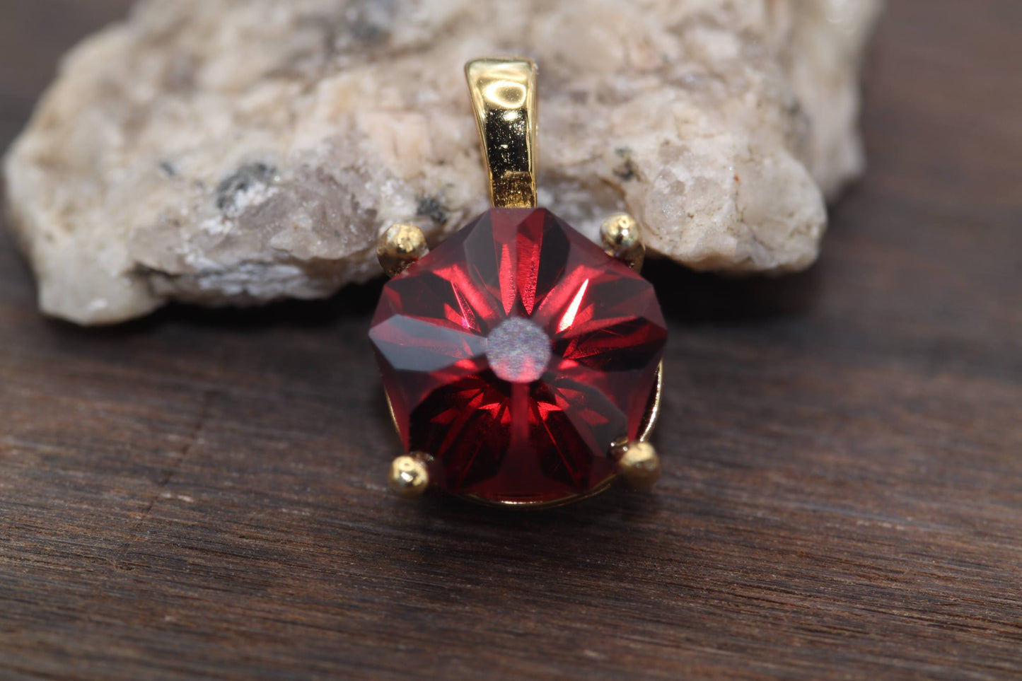 1.35ct Garnet in "Hanami" by Marco Voltolini