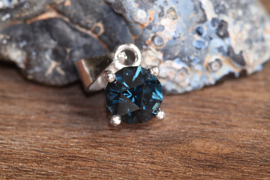 0.6ct Blue Spinel in 'Ruination' by Arya Akhavan