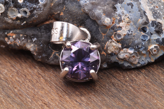 0.76ct Purple Mahenge Spinel in 'Fast Action' by Scott Laborie