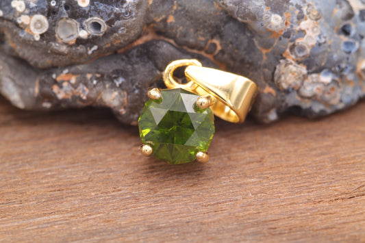 0.6ct Demantoid Garnet in 'Fast Action' by Scott Laborie